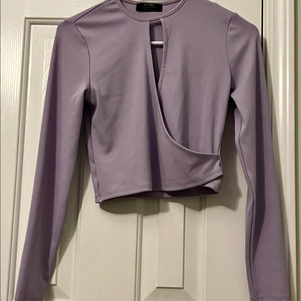 Purple crop top.